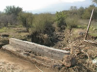 Quebrada El Manzano, al oriente del camino Chicureo/Guay-guay, medianamente embancado. (60,981 bytes)